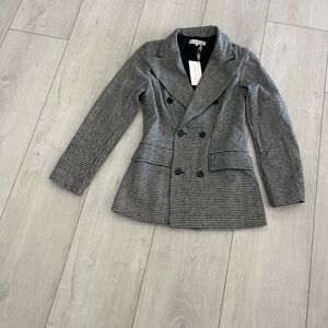 Black and White Blazer with Notched Lapels and Structured Shoulders